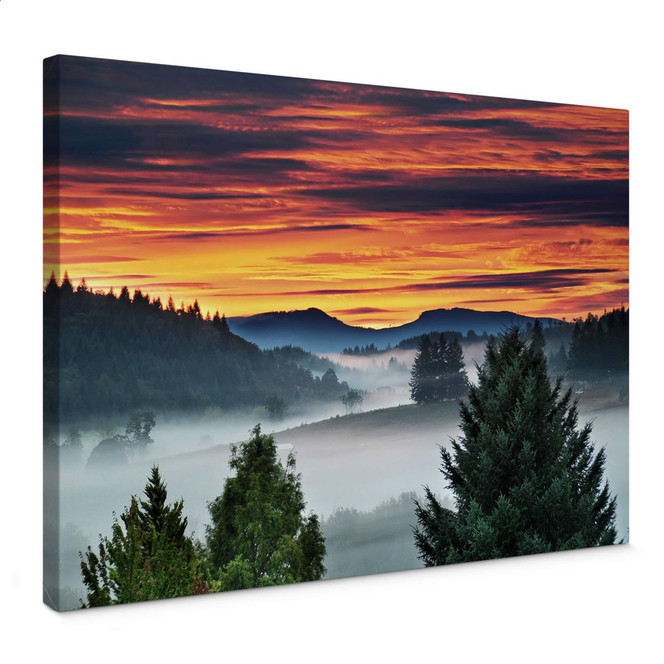 Leinwandbild Nebel in den Bergen