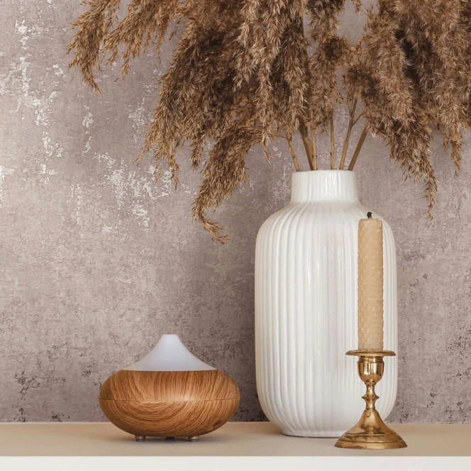 Vliestapete mit schimmerndem Glanz beige Betonoptik