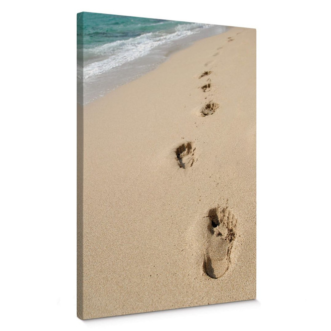 Leinwandbild Fussspuren im Sand