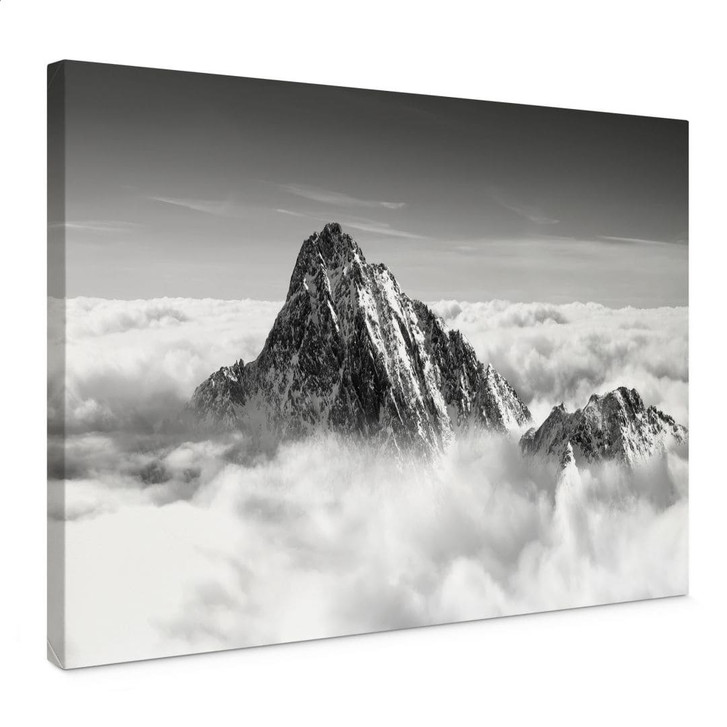Leinwandbild Bergspitze über den weissen Wolken - WA426909